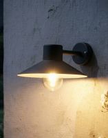 Digital illustration of the "Harrow" Contemporary Black Cone Shaded Wall Light Lit up at Night