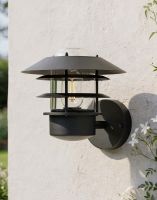 Digital Illustration of the "Skive" Contemporary Wall Light in Black Mounted on a Cream Coloured Sunny Garden Wall