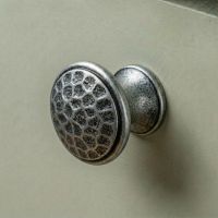 Digital Illustration of the 30mm Hammered Pewter Cabinet Knob on a Sage Green Cupboard