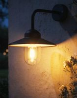 Digital Illustration of the 34cm Version of the Modern Black Top Fix Wall Light Lit up at Night