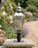 Digital Illustration of the 64cm Bright Chrome Harrogate Pillar Light and Lantern Set Mounted on a Stone Garden Pillar Viewed Face on 