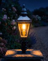 Digital Illustration of the 64cm Bright Chrome Harrogate Pillar Light and Lantern Set Mounted on a Stone Garden Pillar Viewed Face on and Lit up at Night
