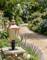 Digital Illustration of the 64cm Copper Harrogate Pillar Light and Lantern Set Mounted on a Garden Pillar next to a Gravel Driveway Digital Illustration of the 64cm Copper Harrogate Pillar Light and Lantern Set Mounted on a Garden Pillar next to a Gravel Driveway