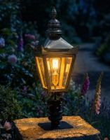 Digital Illustration of the 64cm Polished Brass Harrogate Pillar Light and Lantern Set from an Angled View Lit up at Night