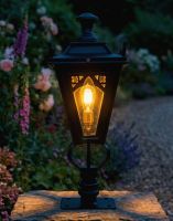 Digital Illustration of the 71cm Black Gothic Pillar Light and Lantern Set Mounted on a Garden Pillar from a Front Facing View Lit up at Night