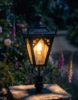 Digital Illustration of the 71cm Black Gothic Pillar Light and Lantern Set Mounted on a Garden Pillar from an Angled View lit up at Night