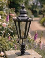 Digital Illustration of the 76cm Black Hexagonal Pillar Light and Lantern Set Mounted on a Stone Pillar in a Garden
