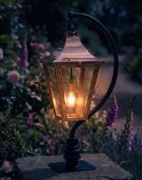 Digital Illustration of the 83cm Copper Swan Neck Pillar & Lantern Mounted on a Stone Garden Pillar Lit up at Night