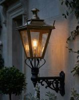 Digital Illustration of the 84 x 37cm Brass Dorchester Wall Lantern on an Ornate Bracket Lit up at Night Digital Illustration of the 84 x 37cm Brass Dorchester Wall Lantern on an Ornate Bracket Lit up at Night