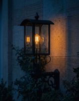 Digital Illustration of the 85 x 65cm Black Curved Top Victorian Porch Wall Light Lit up at Night
