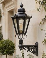 Digital Illustration of the 88 x 33cm Black Hexagonal Wall Lantern on Ornate Bracket Mounted on a Premium Property Entrance