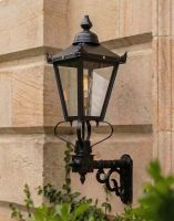 Digital Illustration of the 88 x 33cm Victorian Wall Lantern on a Royale Bracket Mounted on a Traditional Sandstone Brick Property