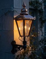 Digital Illustration of the 88cm x 33cm Copper Wall Lantern on Corner Bracket Lit up at Night