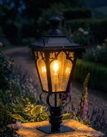 Digital Illustration of the 90cm Black Gothic Pillar Light and Lantern Set Mounted on a Stone Garden Pillar and Lit up at Night