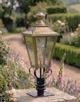 Digital Illustration of the 90cm Brass Dorchester Pillar Light and Lantern Set Mounted on a Stone Garden Pillar.
