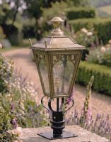 Digital Illustration of the 90cm Brass Gothic Pillar Light and Lantern Set Positioned next to a Flowery Gravel Driveway Digital Illustration of the 90cm Brass Gothic Pillar Light and Lantern Set Positioned next to a Flowery Gravel Driveway