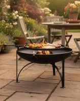 Digital Illustration of the 90cm Simple "Plane Jane" Fire Bowls with Swing Arm and Barbecue Rack Fully Lit on a Rustic Garden Patio Digital Illustration of the 90cm Simple "Plane Jane" Fire Bowls with Swing Arm and Barbecue Rack Fully Lit on a Rustic Garden Patio