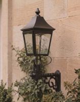 Digital Illustration of the 94 x 53cm Black Traditional Victorian Porch Wall Light Mounterd next to a Traditional Sandstone Brick Entranceway