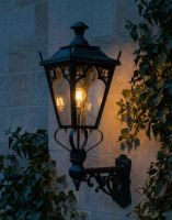 Digital Illustration of the 95 x 48cm Black Gothic Wall Lantern on an Ornate Bracket Lit up at Night 