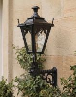 Digital Illustration of the 95 x 48cm Black Gothic Wall Lantern on Royale Bracket Mounted on a Sunny Sandstone Brick Wall