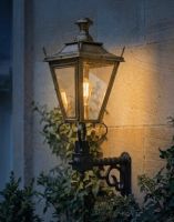 Digital Illustration of the 95 x 48cm Brass Dorchester Wall Lantern on a Royale Bracket Lit up at Night