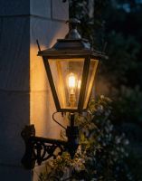 Digital Illustration of the 95 x 48cm Brass Dorchester Wall Lantern on a Corner Bracket Lit up at Night 