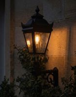 Digital Illustration of the 96 x 53cm Black "Ashington" Deluxe Victorian Wall Light Lit up at Night