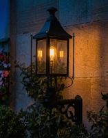 Digital Illustration of the 98 x 66cm Black Victorian Wall Light With Brass Bar Decoration Lit up at Night Digital Illustration of the 98 x 66cm Black Victorian Wall Light With Brass Bar Decoration Lit up at Night