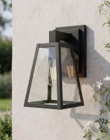 Digital Illustration of the Angular Modern Porch Wall Lantern Mounted on a white Garden Wall in the Sun