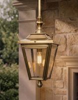 Digital Illustration of the Antique Brass Dorchester Hanging Lantern Suspended Above a Stone Porch