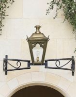 Digital Illustration of the Antique Brass Gothic Bow Bracket Light Mounted Above a Stone Archway