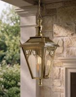 Digital Illustration of the Antique Brass Gothic Chain Hanging Lantern Suspended Above a Decorative Stone Porch