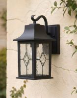 Digital Illustration of the Black "Newham" Traditional Rectangular Top Fix Wall Lantern Mounted on a Cream Coloured Garden Wall