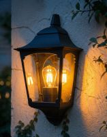 Digital Illustration of the Black "Tattershall" Half Wall Lantern Lit up at Night 