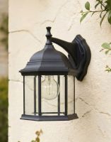 Digital illustration of the Black 36cm x 24cm Version of the Traditional Hexagonal Victorian Top-Fix Wall Lantern Mounted on a Cream Coloured Garden Wall