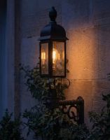 Digital Illustration of the Black Slimline 102 x 47cm Traditional Victorian Wall Light Lit up at Night