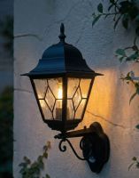 Digital Illustration of the Black Traditional Wall Lantern With Built in PIR Motion Sensor Lit up at Night