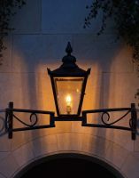 Digital Illustration of the Black Victorian Bow Bracket Light Lit up at Night