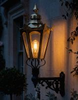 Digital Illustration of the Brass Standard Concordia Hexagonal Lantern On a Capella Bracket Lit up at Night