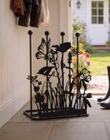 Digital Illustration of the Butterfly Meadow Double Welly Rack Placed in a Tiled Cottage Entranceway