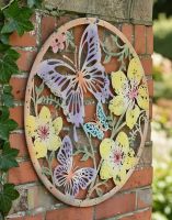 Digital Illustration of the Colourful Butterfly Garden Wall Art Mounted on the Side of a Red Brick House
