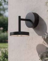 Digital Illustration of the Contemporary Adjustable Halo Wall Light Mounted on a Cream Coloured Exterior Wall