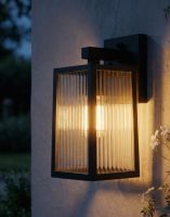 Digital Illustration of the Copper Version of the Davenport Ribbed Glass Wall Light Lit up at Night