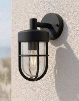 Digital Illustration of the Crofton Caged Garden Wall Light Mounted on a a White Coloured Coastal Building
