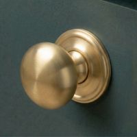Digital Illustration of the 38mm Individual Satin Brass Mushroom Cabinet Knob Mounted on a Blue Cupboard Door Digital Illustration of the 38mm Individual Satin Brass Mushroom Cabinet Knob Mounted on a Blue Cupboard Door