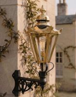 Digital Illustration of the Large Brass Concordia Hexagonal Lantern Witha Corner Bracket Mounted on a Sandstone Brick Building Wall