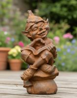Digital Illustration of the Rustic Cast Iron "Cheeky Elf" Garden Sculpture Placed on Some Garden Decking