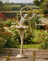 Digital Illustration of the Rustic Cream Cast Iron Ballet Dancer Garden Sculpture Placed on a Garden Patio with Countryside Garden Scene Behind Digital Illustration of the Rustic Cream Cast Iron Ballet Dancer Garden Sculpture Placed on a Garden Patio with Countryside Garden Scene Behind