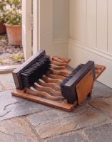 Digital Illustration of the Rustic Three in One Boot Jack Boot Brush and Scraper on a Stone Floor Cottage Hallway