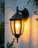 Digital Illustration of the Small Black Version of the Traditional "Clear Skies" Aluminium Victorian Top Fix Wall Lantern Lit up at Night